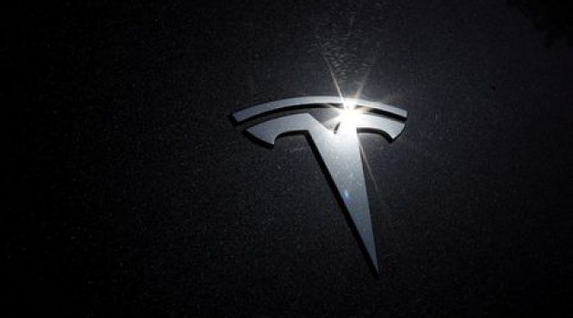 Tesla directors pay $735 million to settle lawsuit over excess compensation